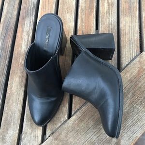 Black heeled mules